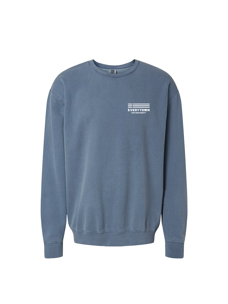 Front view of a light blue crewneck sweatshirt with a small white Everytown for Gun Safety logo printed on left chest.