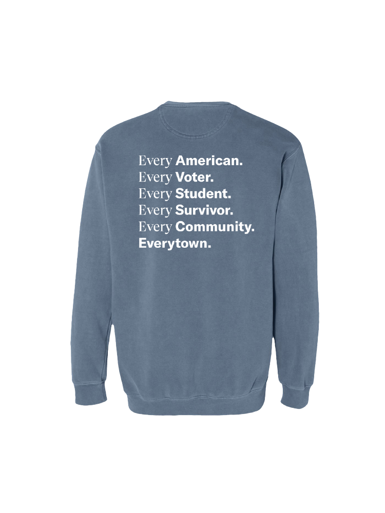 Back view of a light blue crewneck sweatshirt with large white print that reads: Every American. Every Voter. Every Student. Every Survivor. Every Community. Everytown.