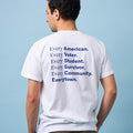 Back view of a man wearing a white unisex short sleeve t-shirt with large dark blue print that reads: Every American. Every Voter. Every Student. Every Survivor. Every Community. Everytown.