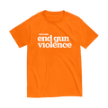 Orange short-sleeve unisex t-shirt, front view. In large white print across the chest, it reads: we can end gun violence. The dot of the i in violence is printed in light orange.