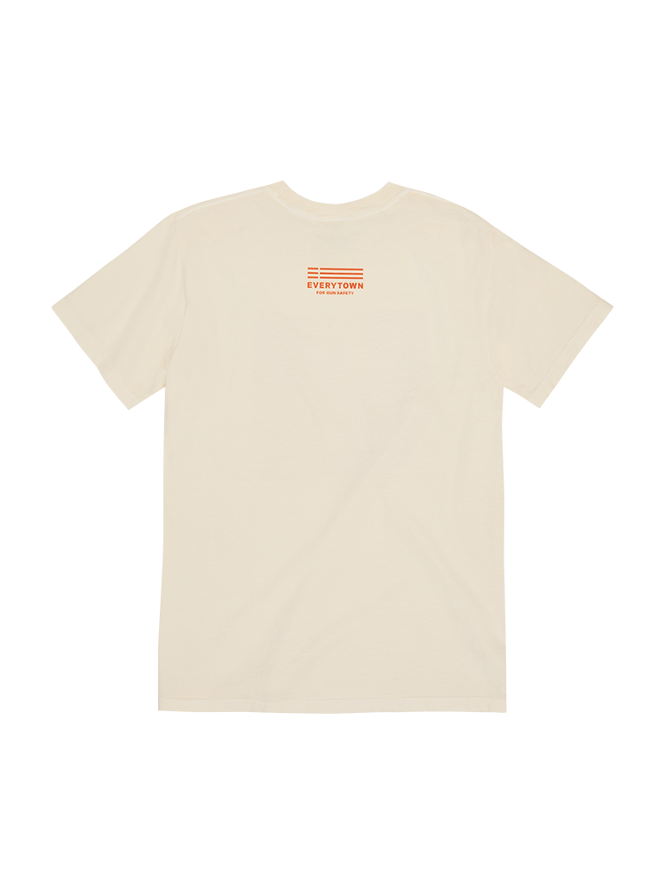 Cream colored short-sleeve unisex t-shirt, back view. The Everytown for Gun Safety logo is printed in orange, just below the collar.