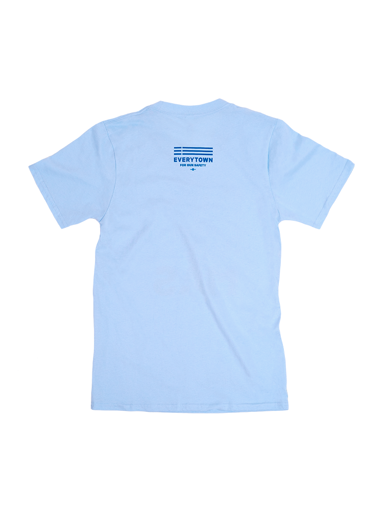 Back view of a light blue short sleeve unisex t-shirt with the Everytown for Gun Safety logo printed in blue below the collar.